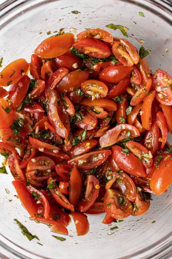 ingredients to make pasta mixed together in bowl