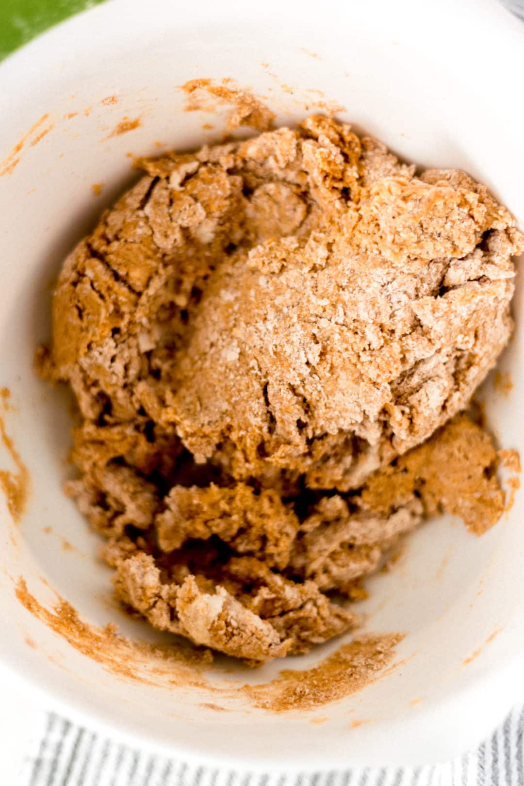 Dough for pumpkin scones in a mixing bowl