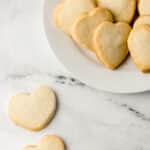 finished cookies on marble surface and white plate