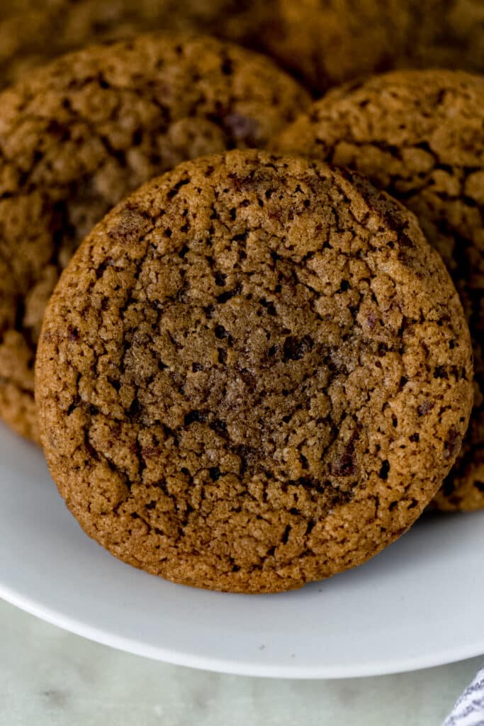 freshly baked coffee cookies on a white plate 