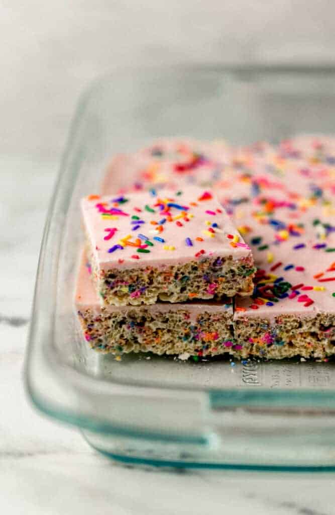 close up side view of finished rice krispie treats cut into squares