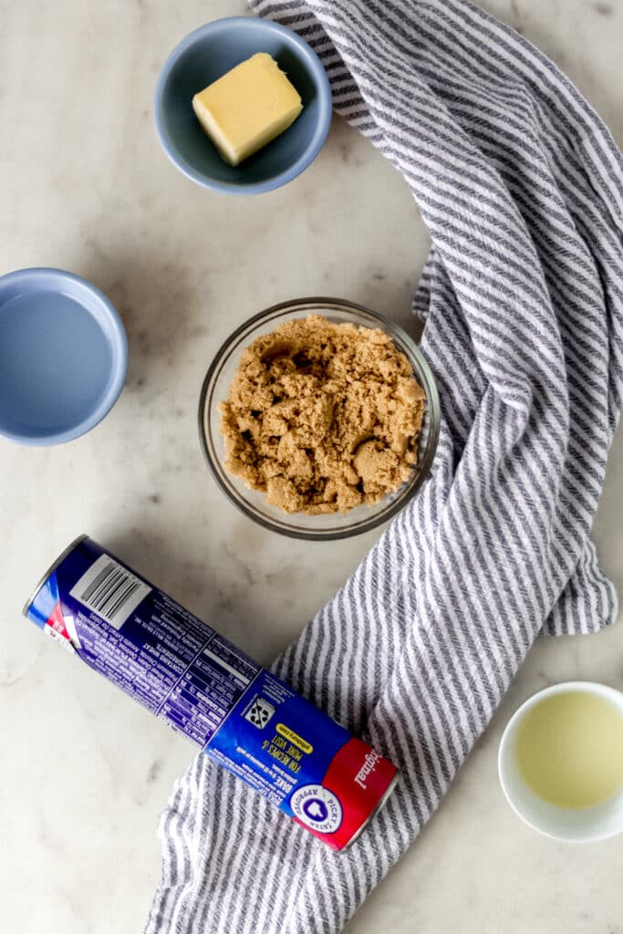 ingredients for sticky buns on counter with striped napkin