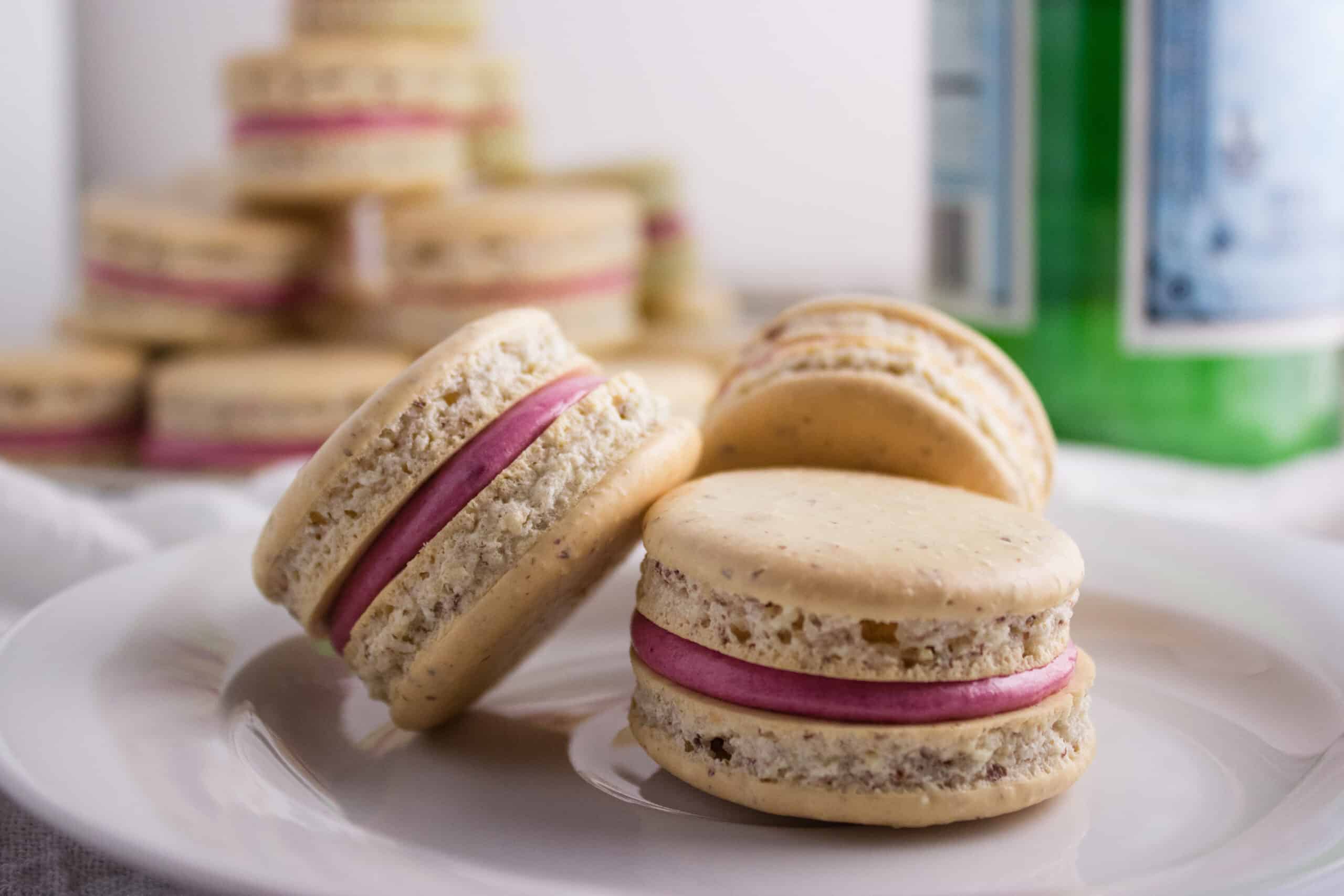 Close up view of macarons on plate. 