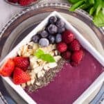 overhead view bright berry acai smoothie bowl