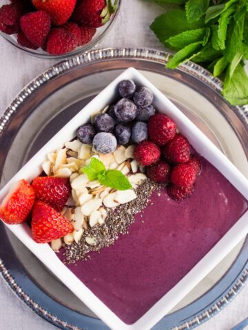 overhead view bright berry acai smoothie bowl