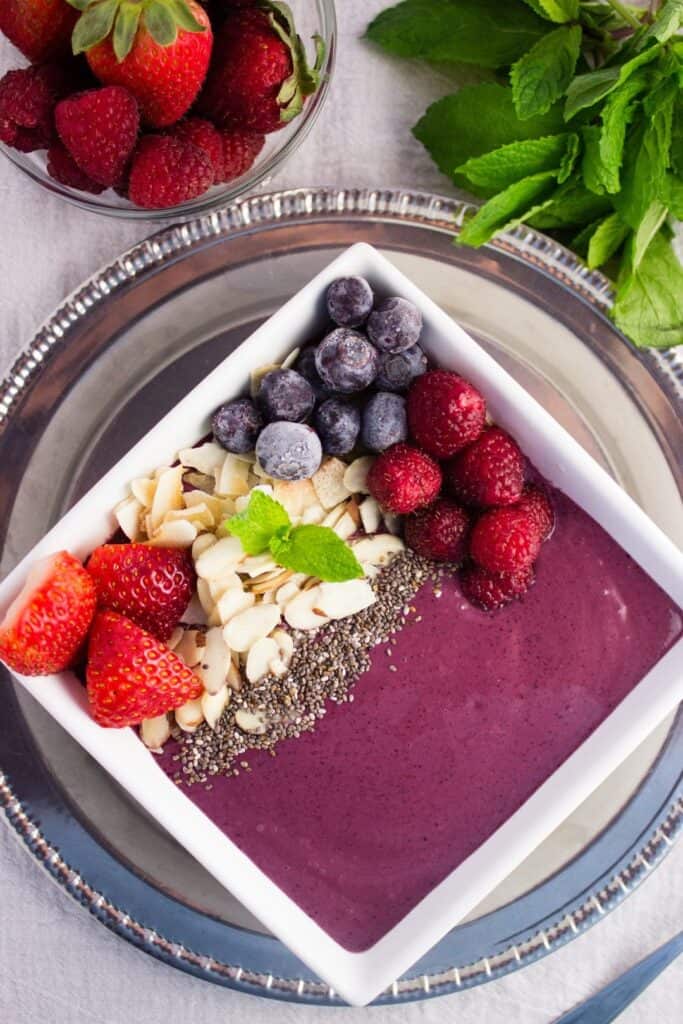 overhead view bright berry acai smoothie bowl 