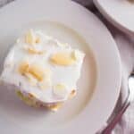 Tres Leches Cake Recipe - So easy and delicious! A simple cake that is soaked in a three full flavored milk mixture and topped with whipped cream. simplylakita.com #cincodemayo #treslechescake