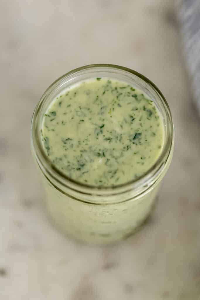 cilantro lime dressing in a small glass jar