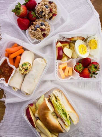 overhead view of finished breakfasts in four separate containers