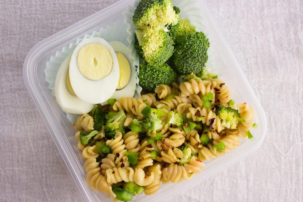 pasta, broccoli, and eggs in container