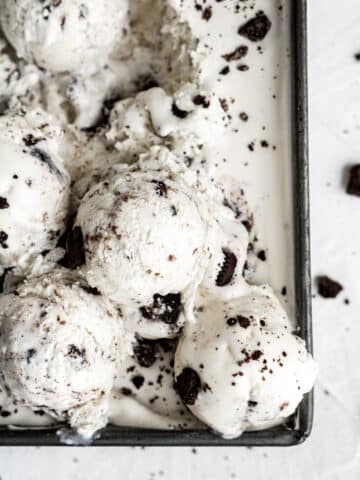 overhead view cookies and cream ice cream in container.