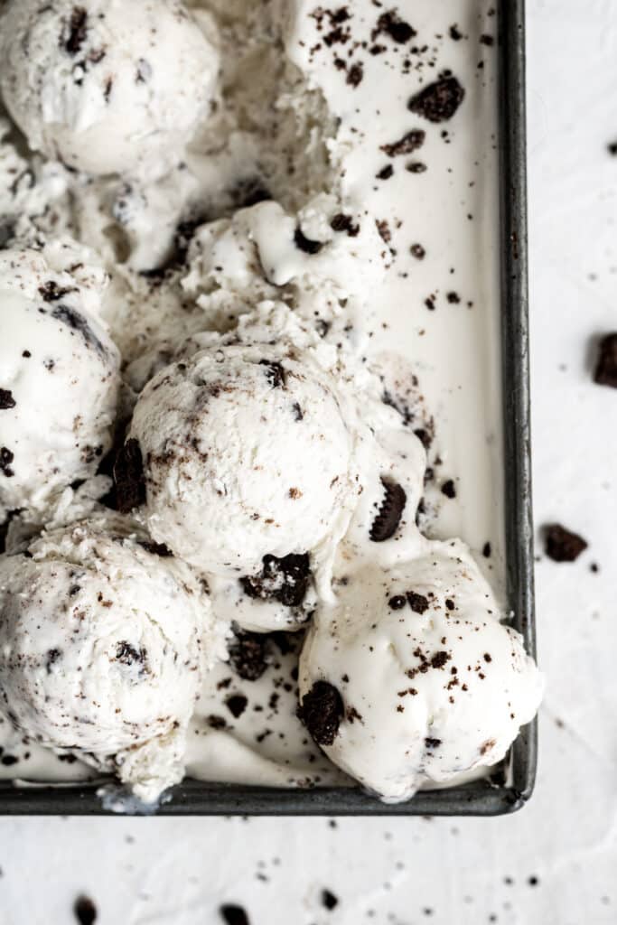overhead view cookies and cream ice cream in container.