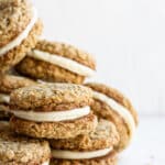 stack of oatmeal cream pies on white surface.
