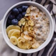 Overhead view of finished oats in a bowl.