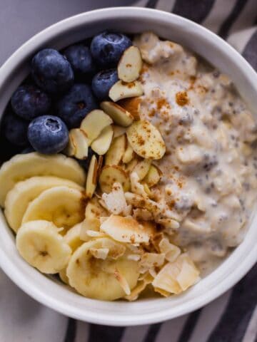 Overhead view of finished oats in a bowl.