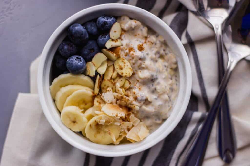 Overhead view Almond Overnight Oats in a bowl