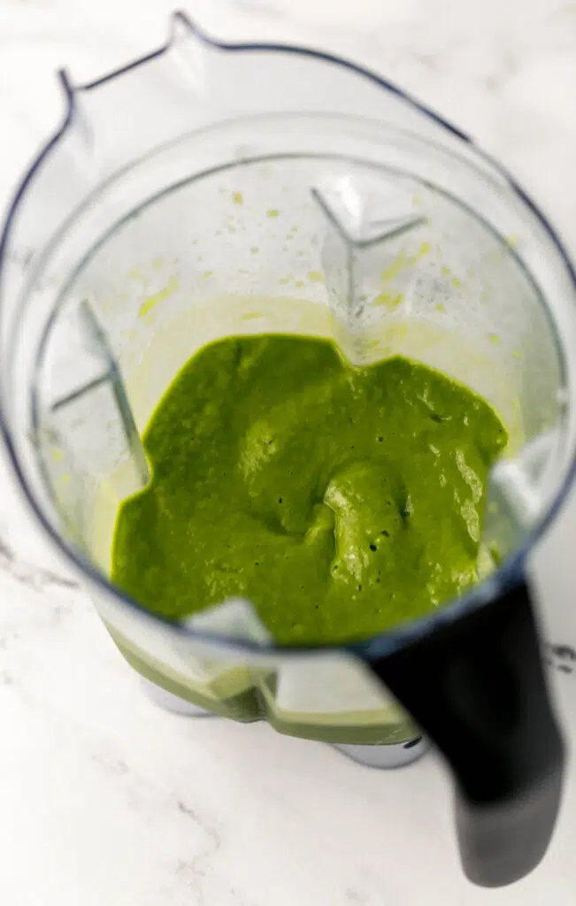 green smoothie in blender pitcher