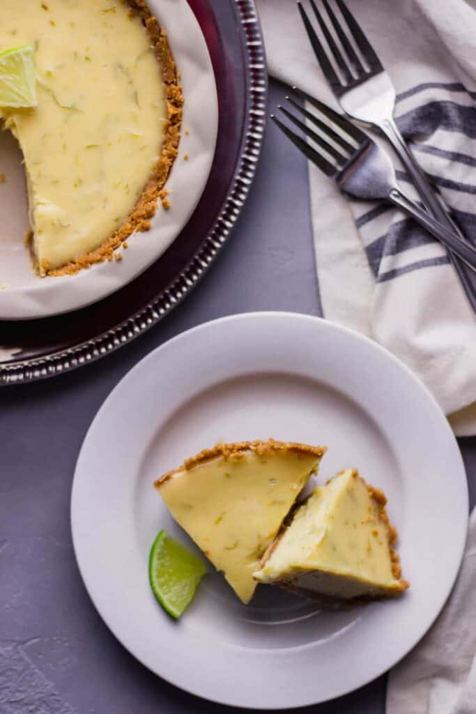 close-up view of key lime pie for 2 with forks