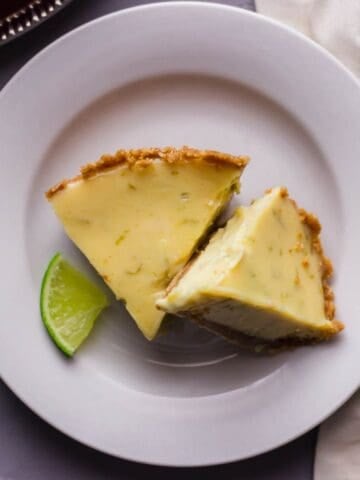Overhead view of slices of pie on plate.