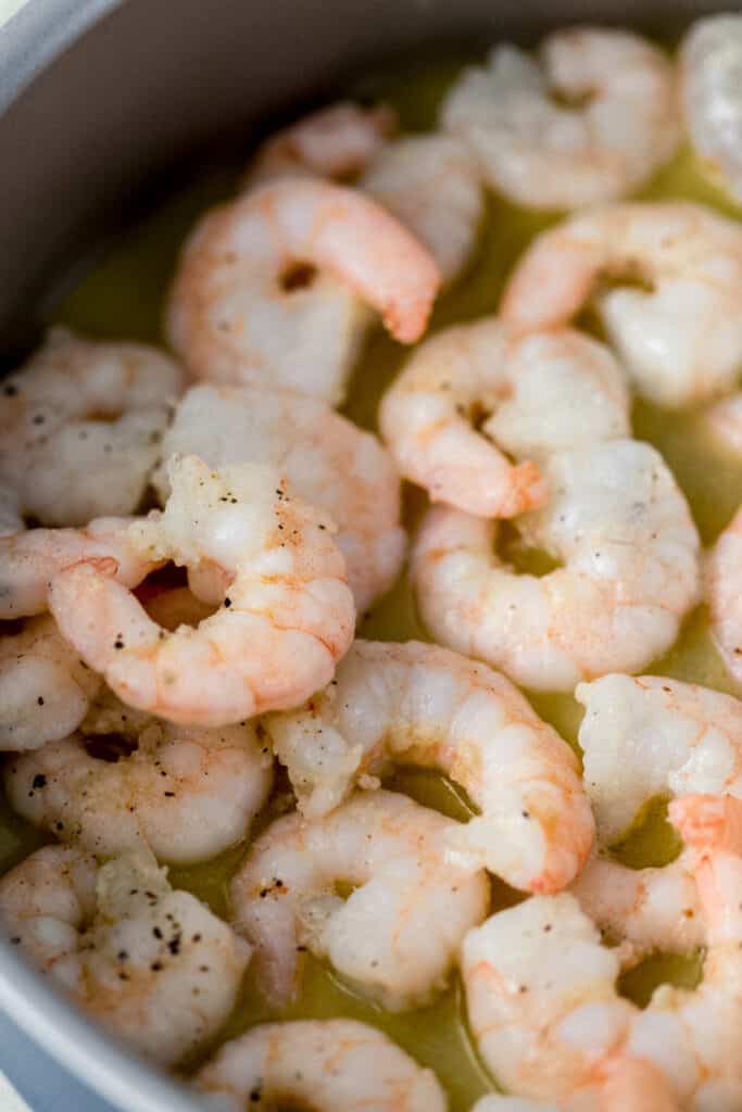 cooked shrimp with garlic and butter in skillet