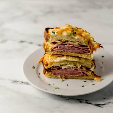 sandwich cut in half on white plate