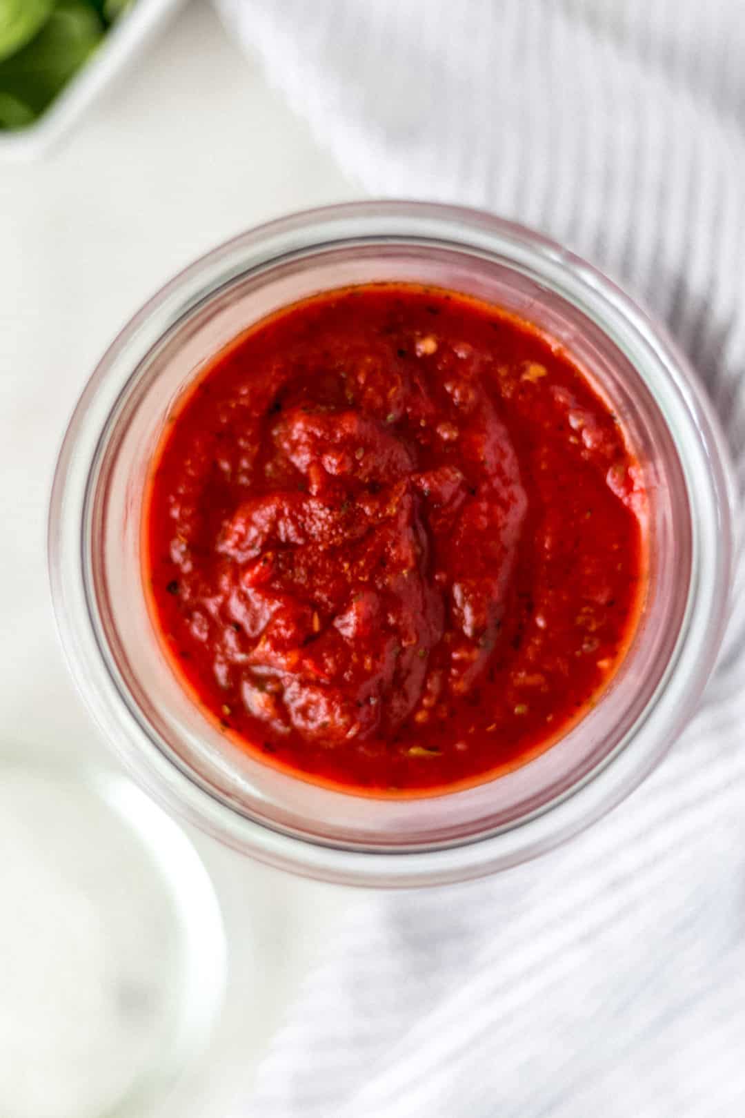 overhead view of pasta sauce in a jar