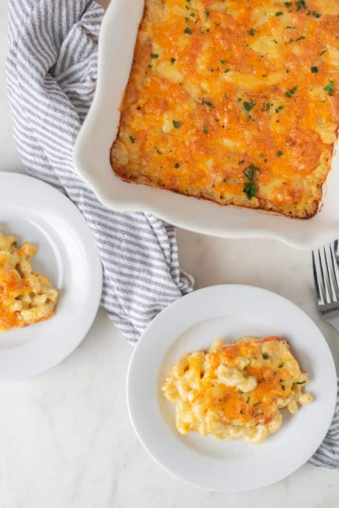 Southern Mac and Cheese in baking dish and on two round plates 
