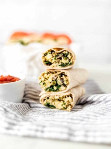 side photo of stacked breakfast burritos recipe