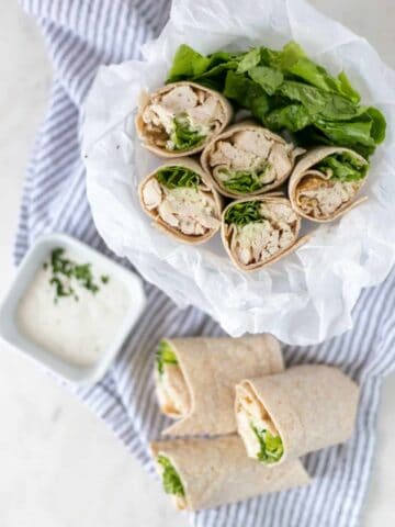 Easy to make Chicken Ranch Wraps are loaded with chicken, cheese, ranch dressing, and lettuce for a delicious lunch option. simplylakita.com #chicken #10minuterecipe
