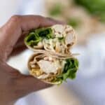 hand holding chicken ranch wrap