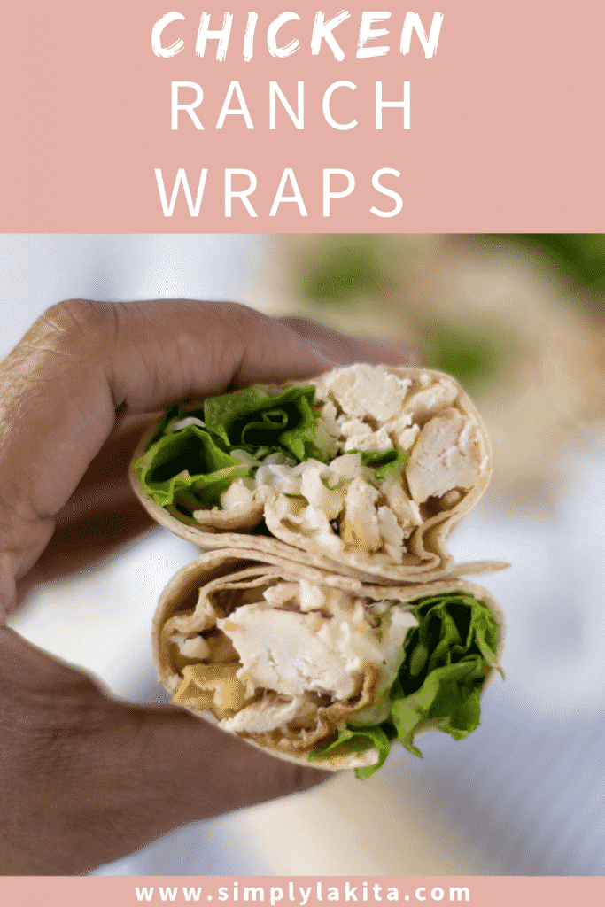 close-up of hand holding chicken ranch wrap