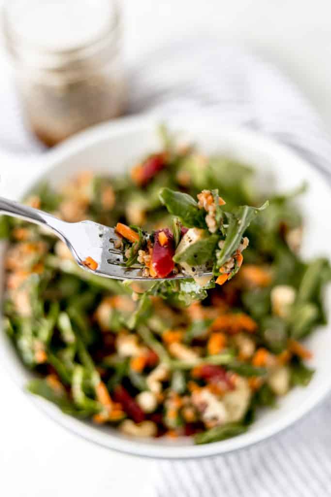 close-up of fork full of salad 