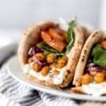 Spicy Chickpea Gyros is a simple and delicious Mediterranean inspired recipe that is full of flavor and contains a tasty tzatziki sauce. simplylakita.com #gyros #vegetarian