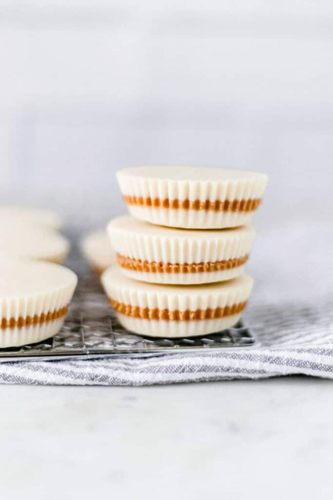 close-up side view of white chocolate peanut butter cups 