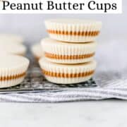 Close up front view of cups stacked on each other on pin with text overlay.