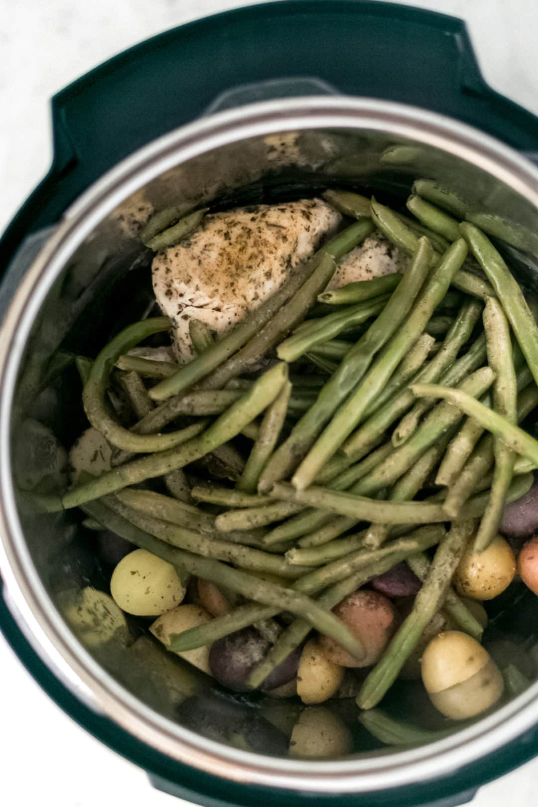 cooked instant pot chicken and potatoes with green beans