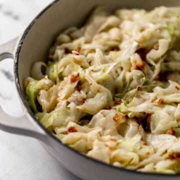 finished cabbage combined with bacon and sauce in large skillet