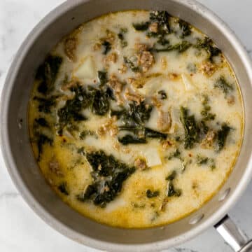 finished soup in a saucepan on a marble surface