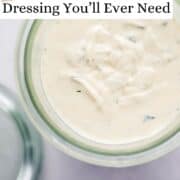 Overhead view of finished dressing in jar by lid on pin with text overlay.
