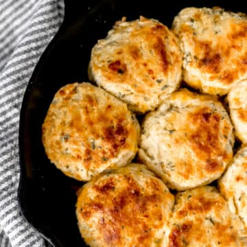 cheddar and herb biscuits in cast iron skillet