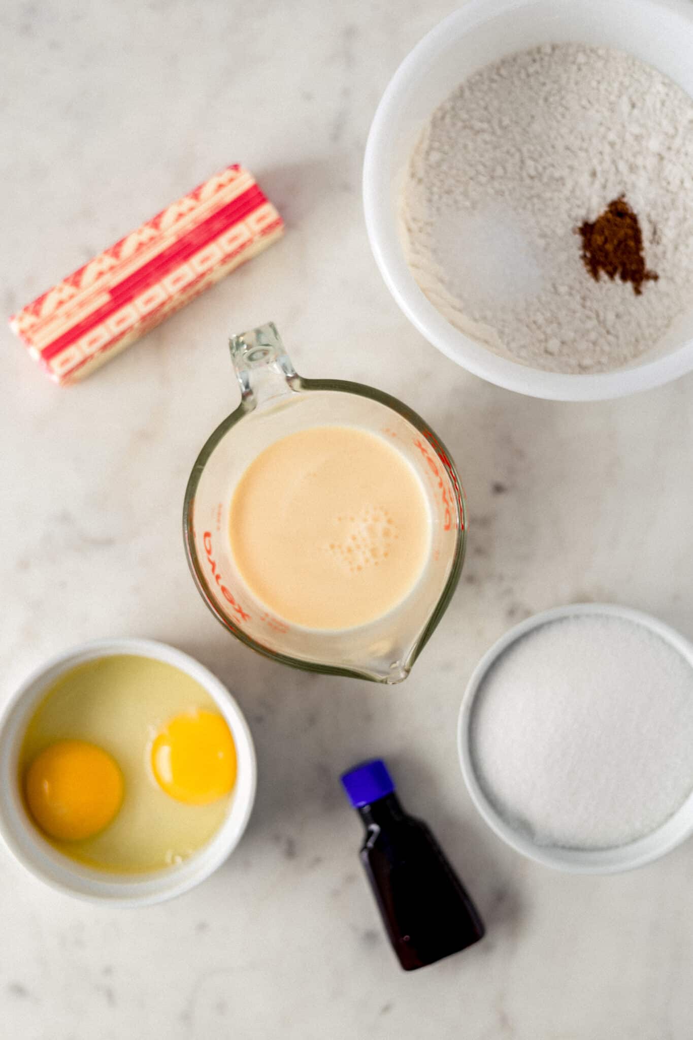 ingredients for eggnog cake arranged on the counter
