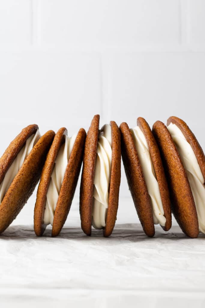 row of gingerbread whoopie pies beside each other