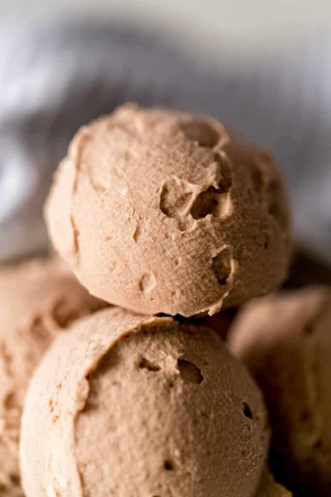 close up of keto chocolate fat bomb in a white bowl