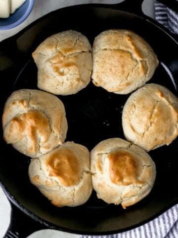 Finished Biscuits in a Cast Iron Skillet.