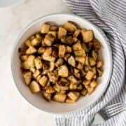 Overhead view of bowl of roasted potatoes.