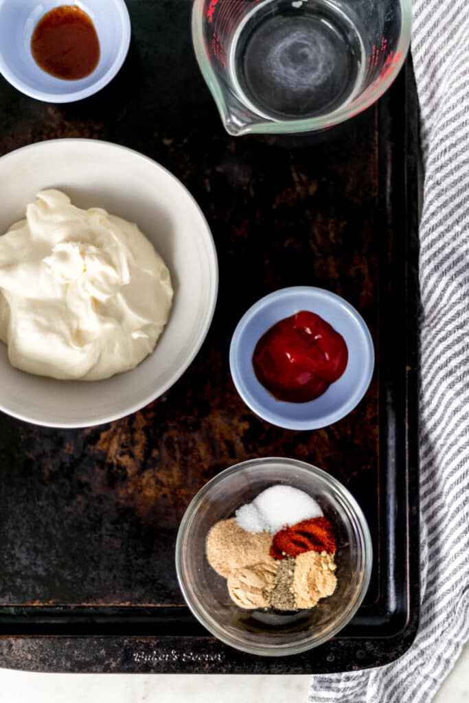 ingredients to make yum yum sauce on sheet pan