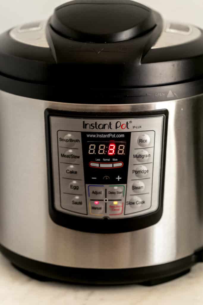side view of instant pot set to 3 minutes cook time 