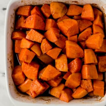 overhead view of finished candied yams in square white baking dish