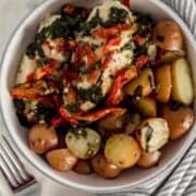 Overhead bowl of finished chicken and potatoes on pin with text overlay.