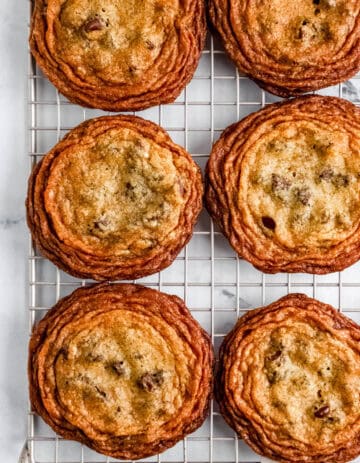 Baked cookies on a cooling rack.